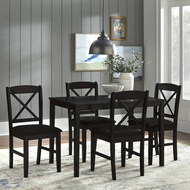 Dark wood dining 2024 table with white chairs